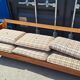 Brutalist-style bench and armchairs in 1970s pine.