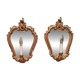 Vintage gold mirror sconces from the late 1950s.