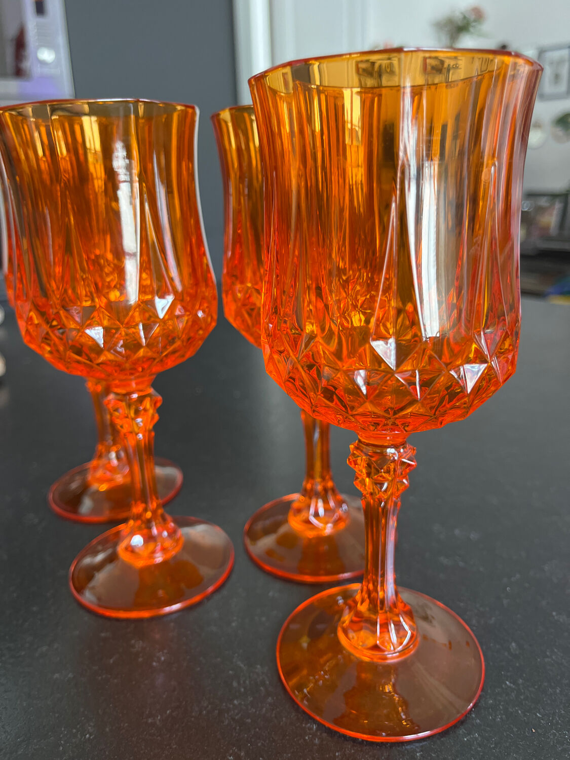 4 orange crystal glasses