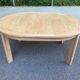 Table à manger scandinave ronde extensible décapée en chêne brut 1970