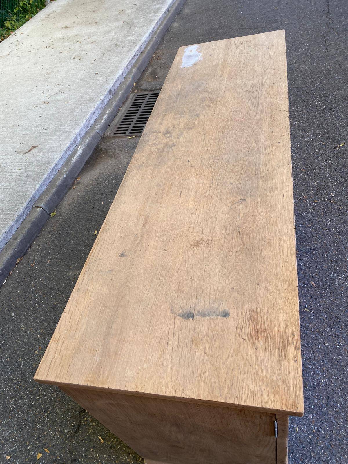Vintage 1950s oak enfilade buffet with tapered legs.