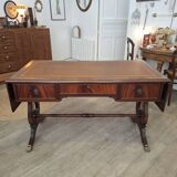 English desk in solid mahogany with lion paws. Leather top