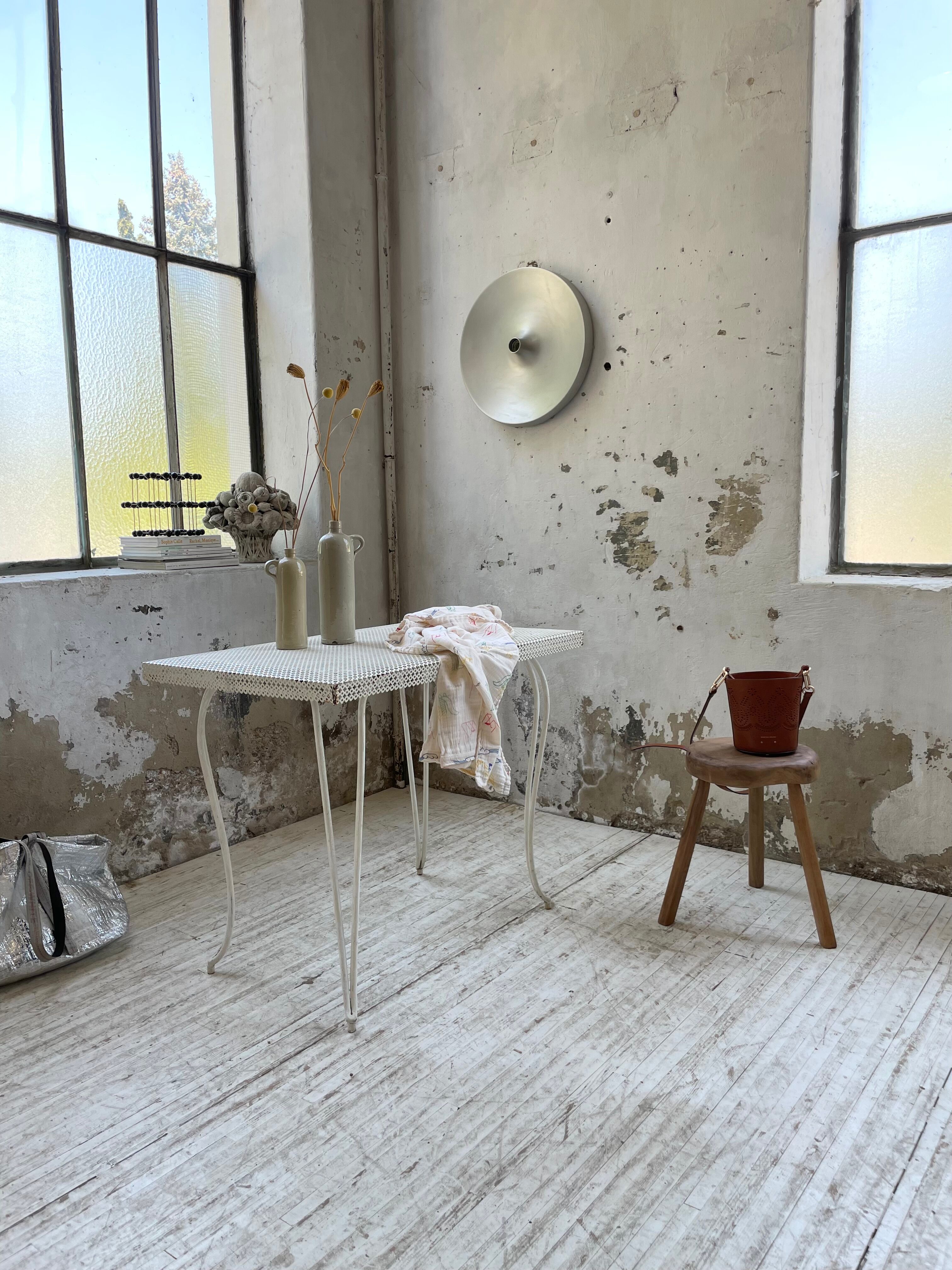 Perforated garden dining table