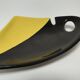 Empty pocket anthropomorphic ceramic black and yellow design 50s