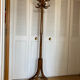 Baumann parrot coat rack