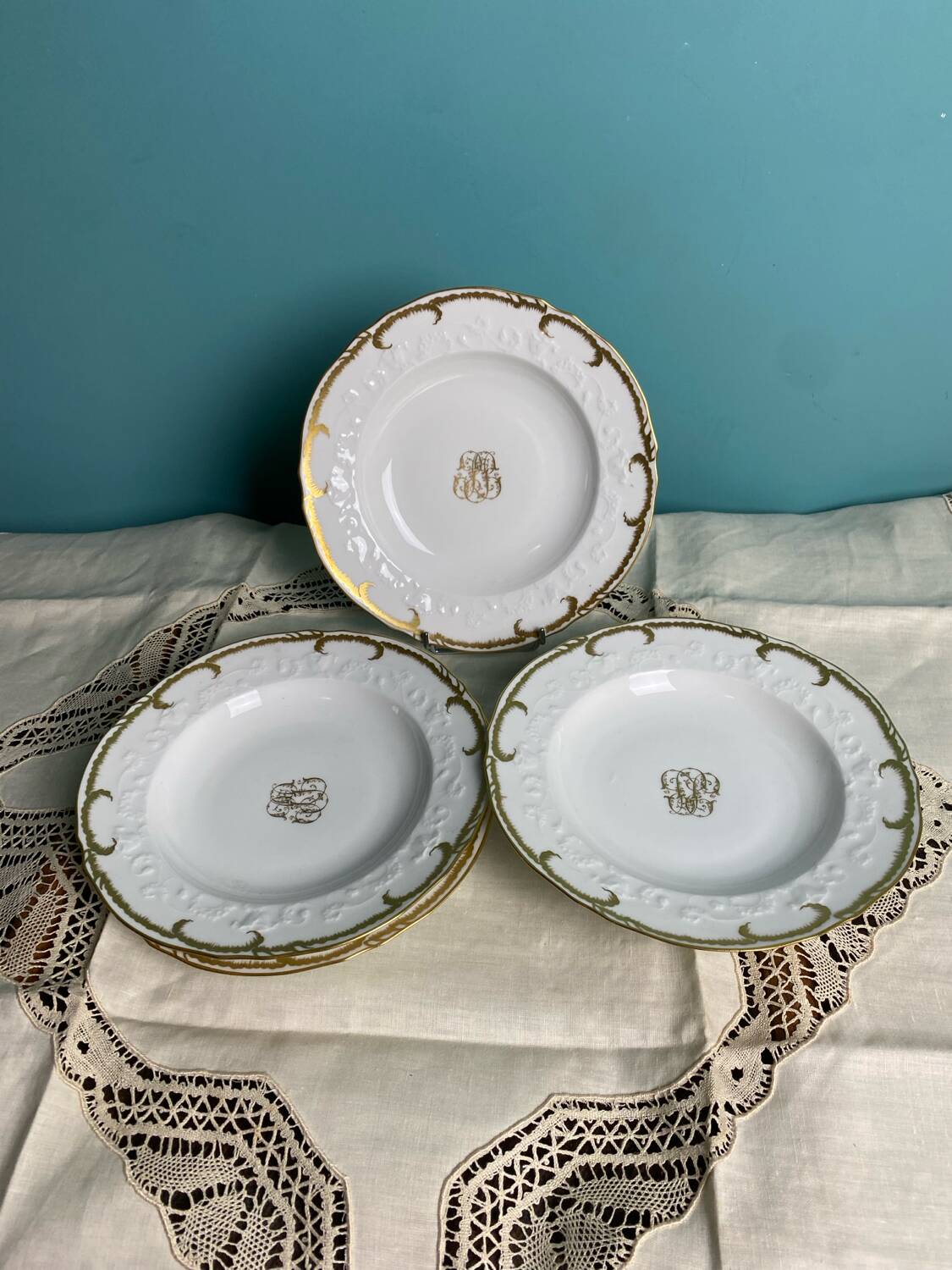 4 deep plates from Limoges with the PJC gold monogram.