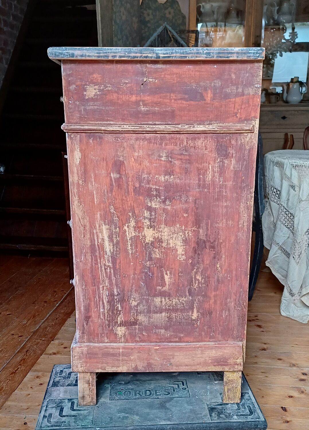 Antique piece of furniture with a grey patina.