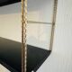 Vintage adjustable “string” shelf in metal and brass, Circa 60's