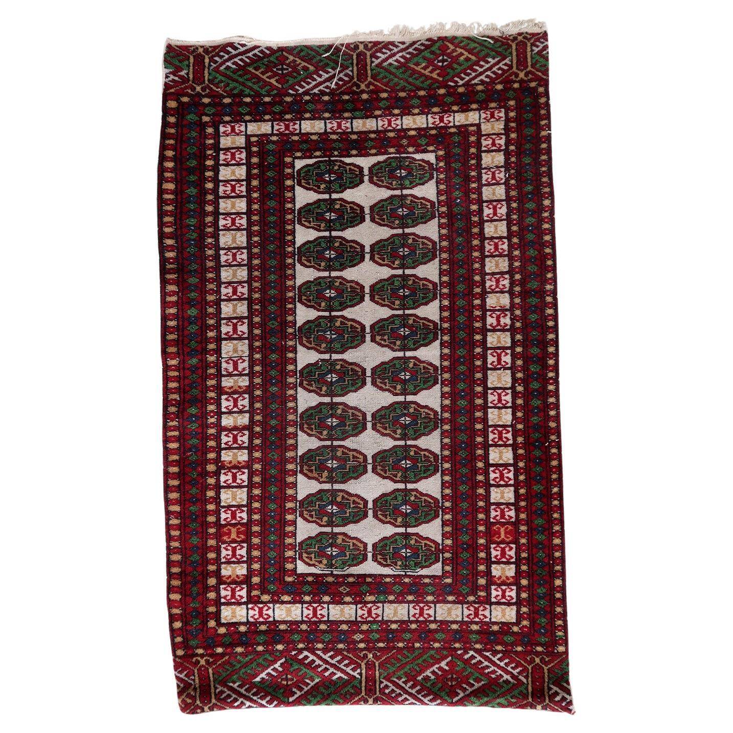 Handmade vintage Uzbek Bukhara rug 77cm x 128cm 1960s - 1С1175