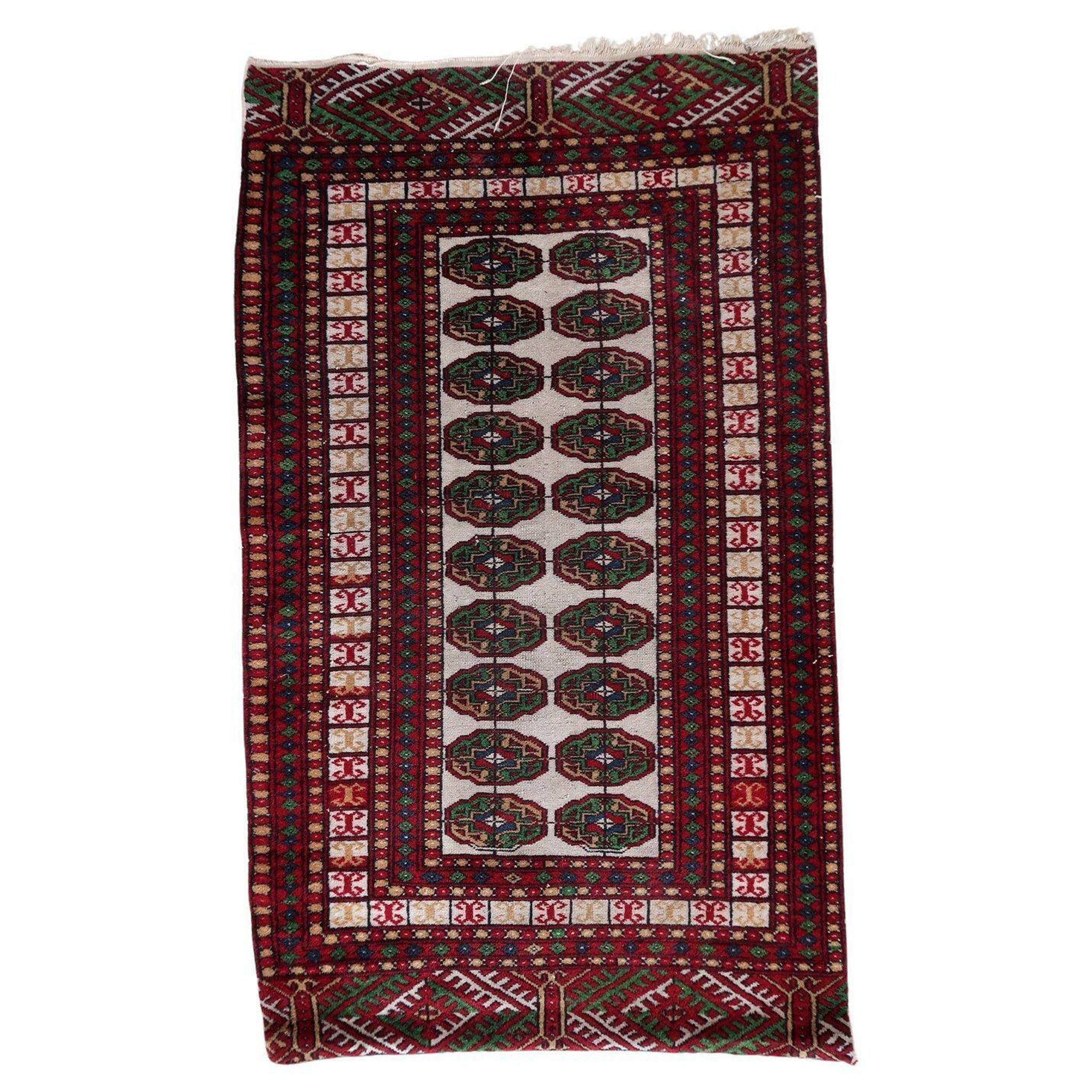 Handmade vintage Uzbek Bukhara rug 77cm x 128cm 1960s - 1С1175