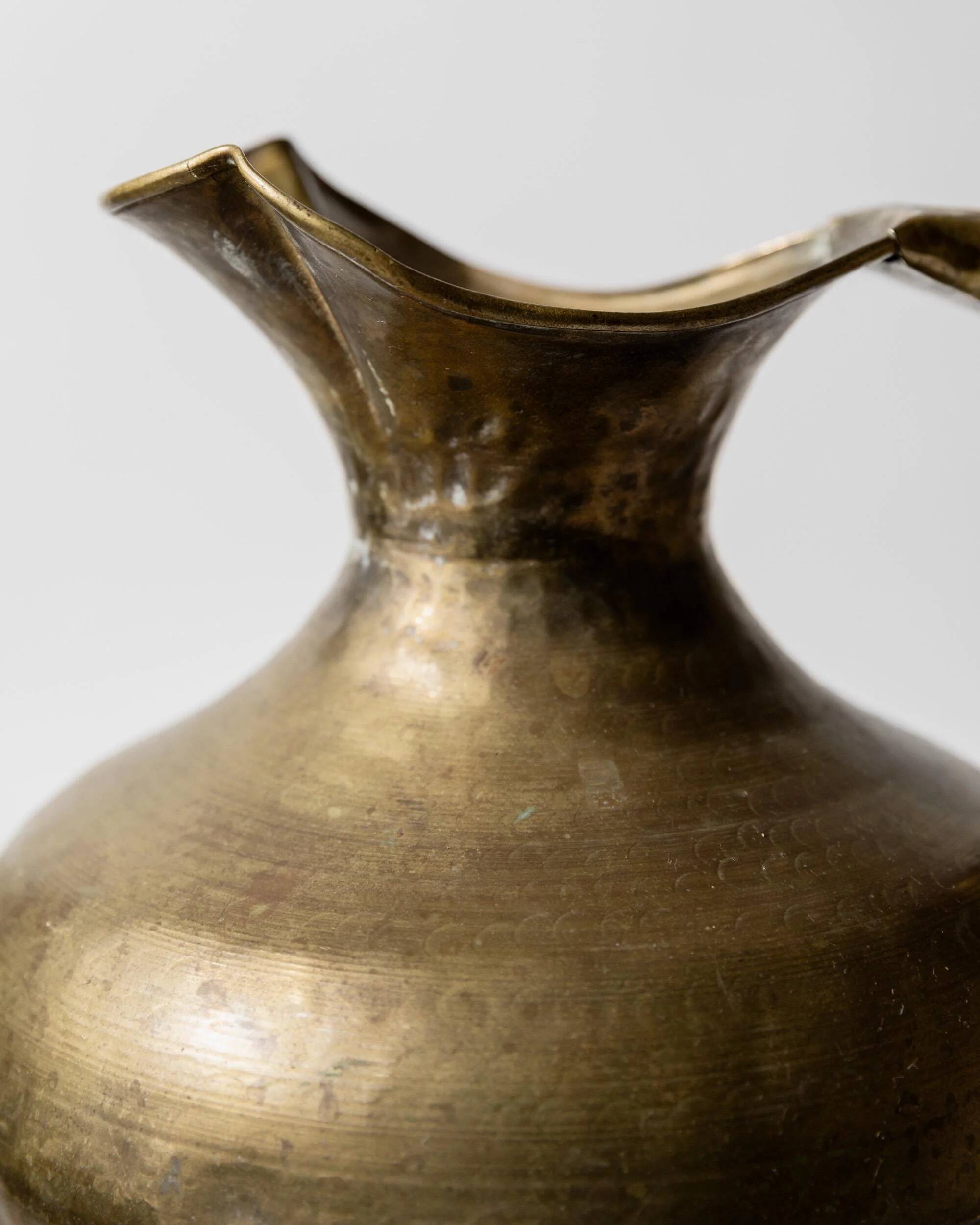 Vintage brass vase from the 1940s, hand-hammered metal, amphora shape, Italian design from the 1940s.