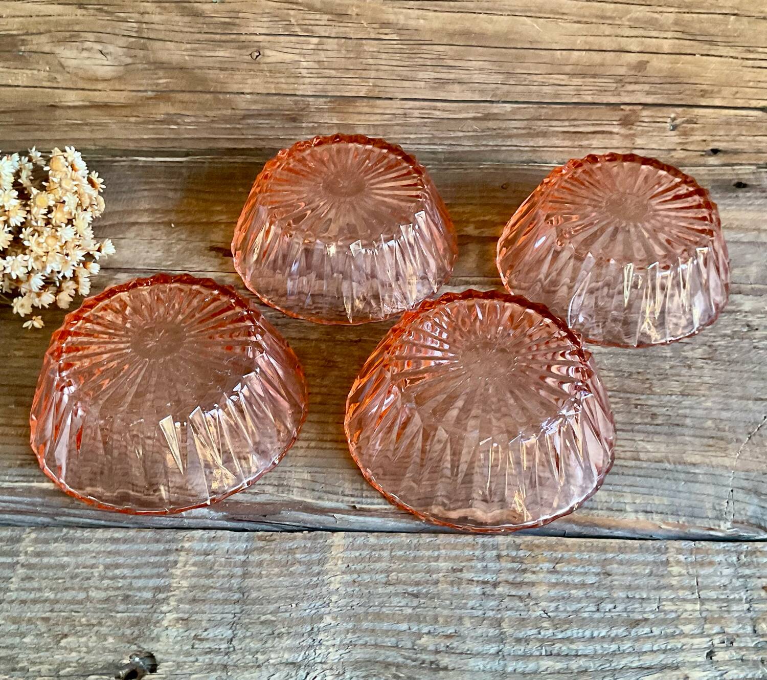 4 pink glass bowls