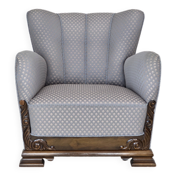 Fauteuil danois des années 1950, tissu d'ameublement, bois de chêne sculpté.