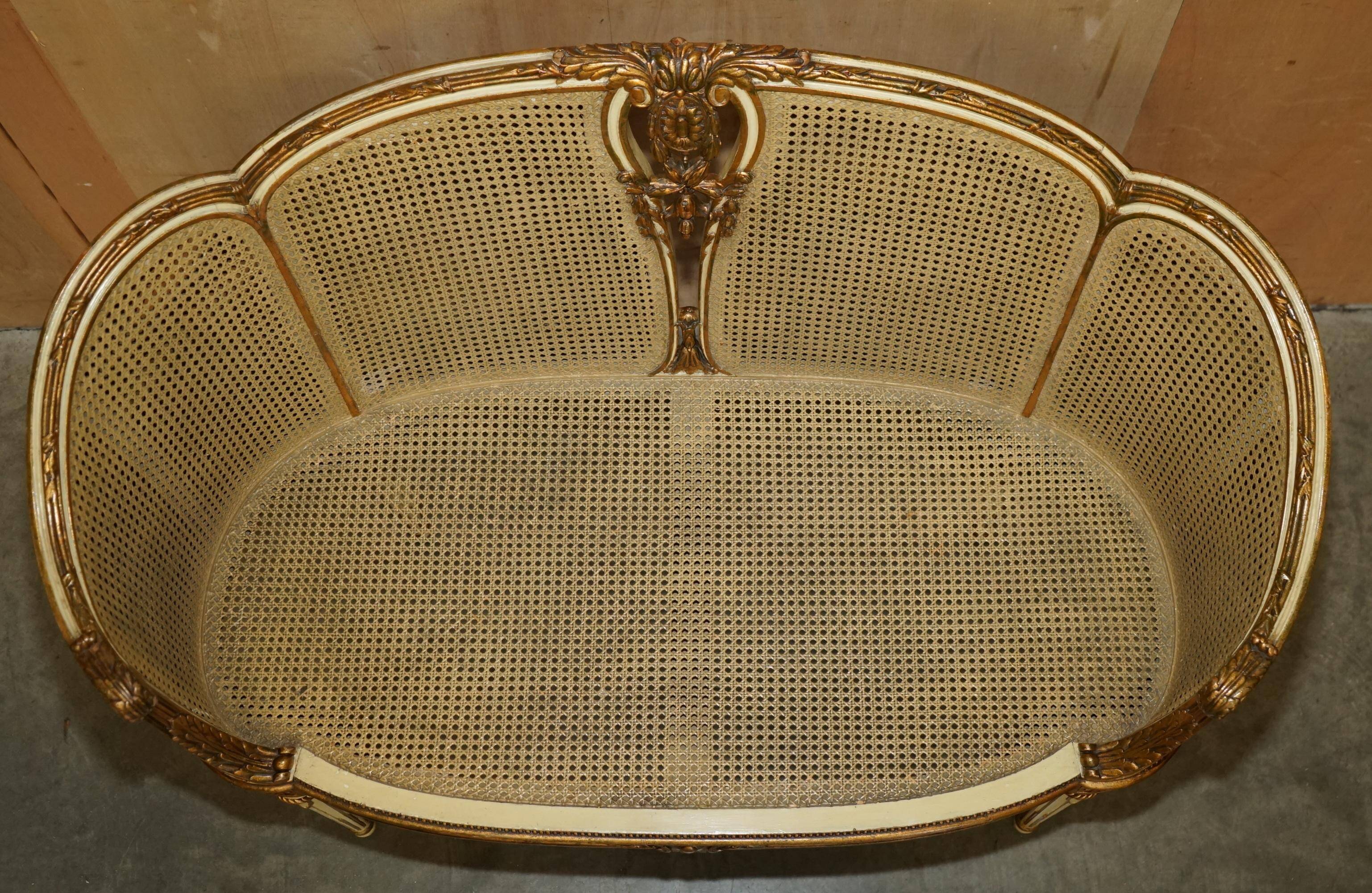 Louis XVI Bergère canapé in gilded wood with double caning