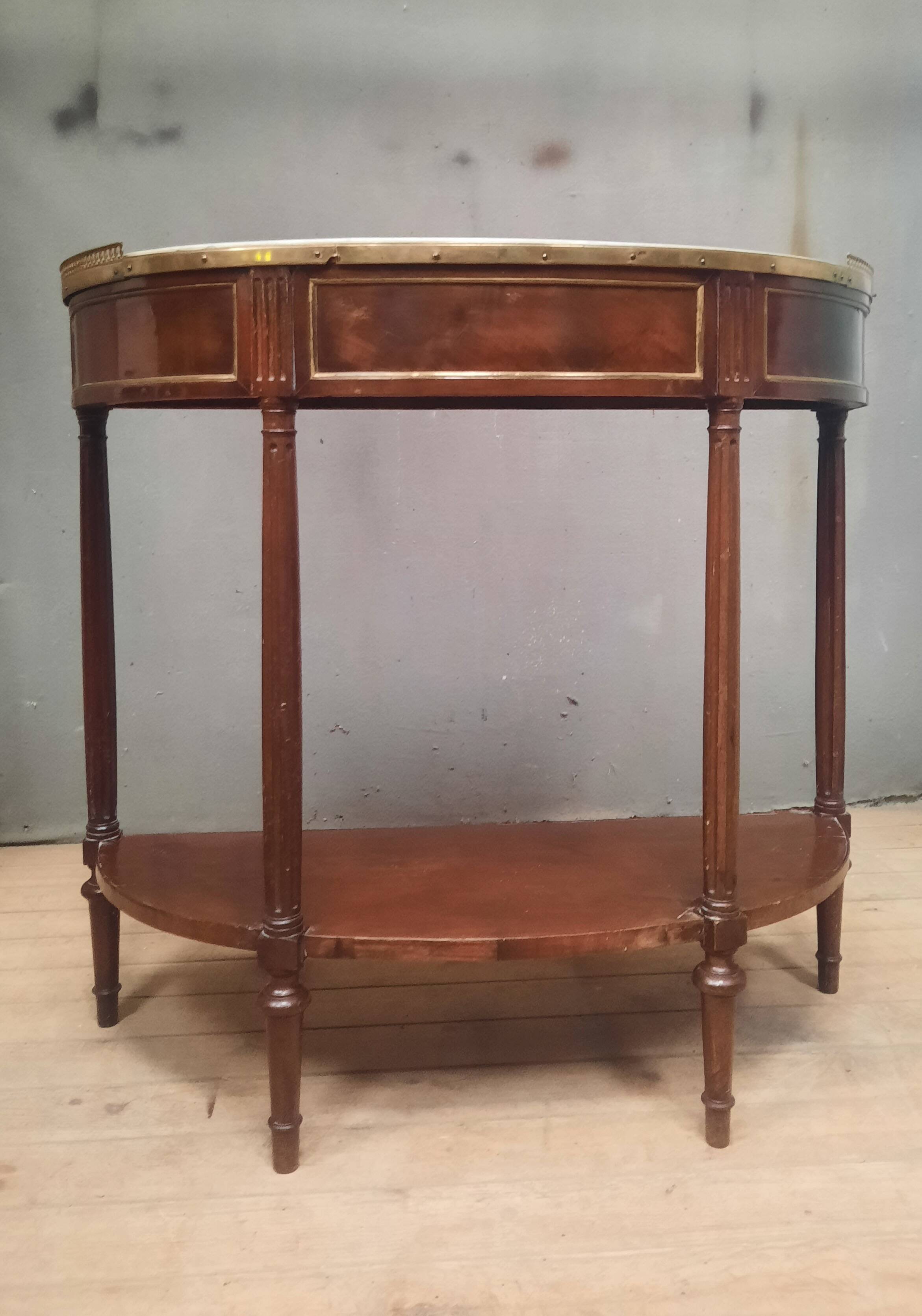 Louis XVI period demi-lune console in mahogany.