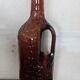 Bouteille à anse verre ambré