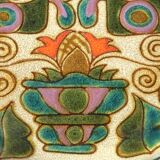 Vintage ceramic plate with peacock bird decoration.