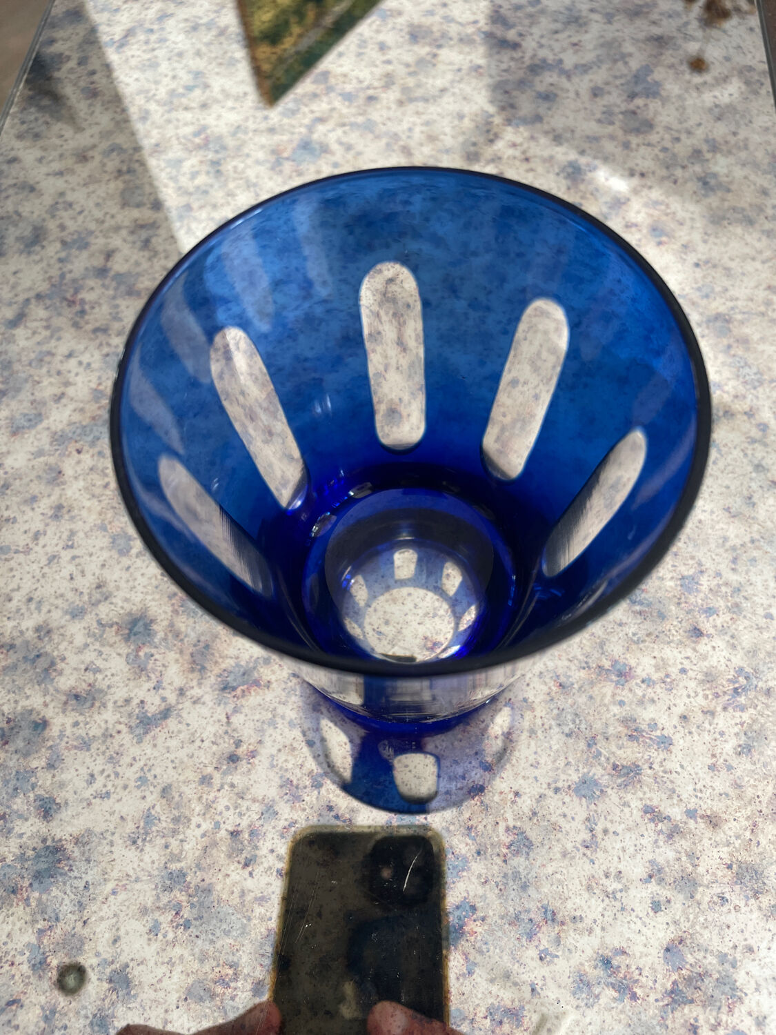 Antique crystal glass lined blue.