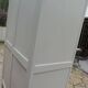 Armoire Art Déco réenchantée en beige.