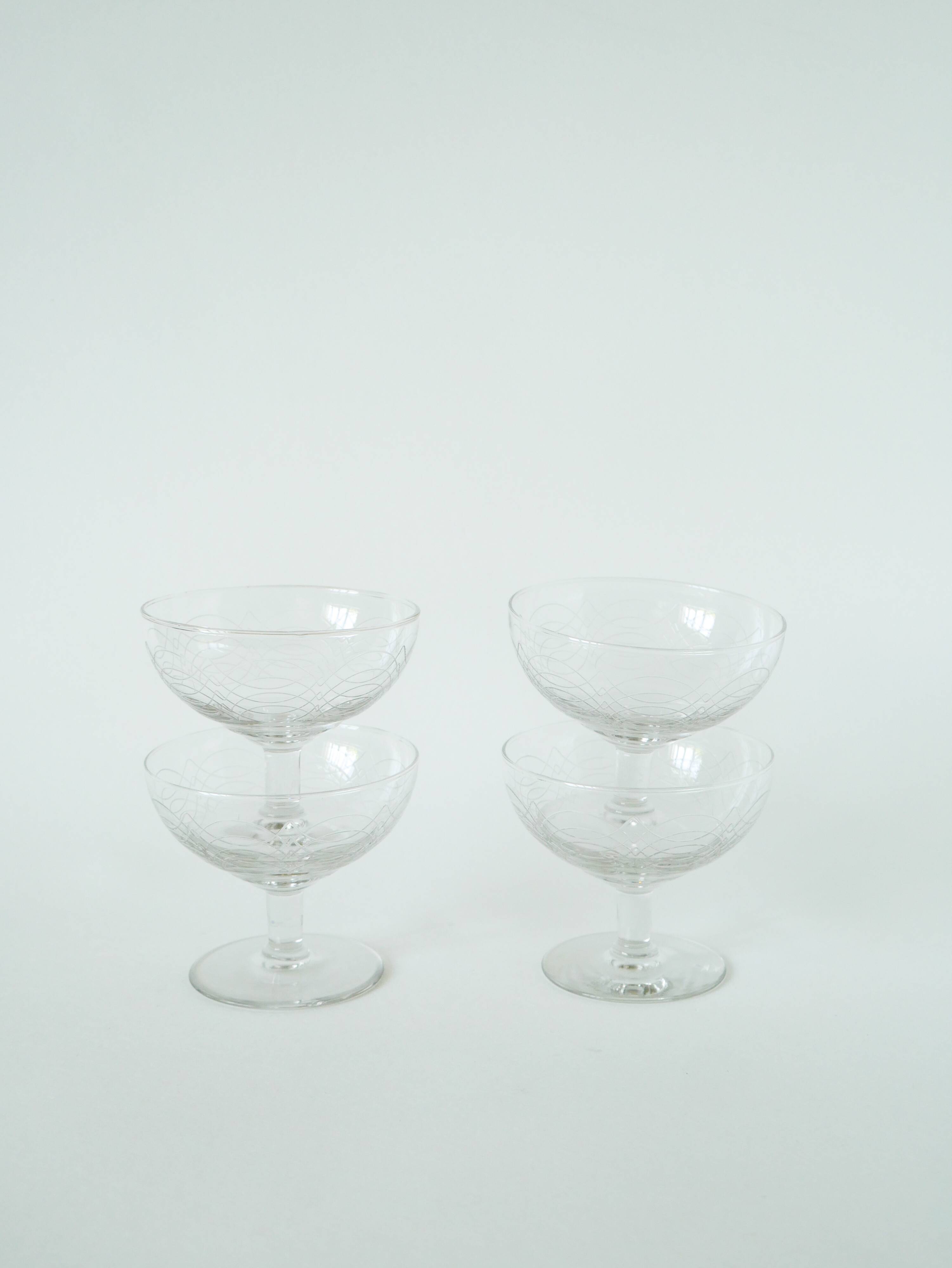 Set of 4 engraved crystal champagne glasses, arabesque motifs, 1950