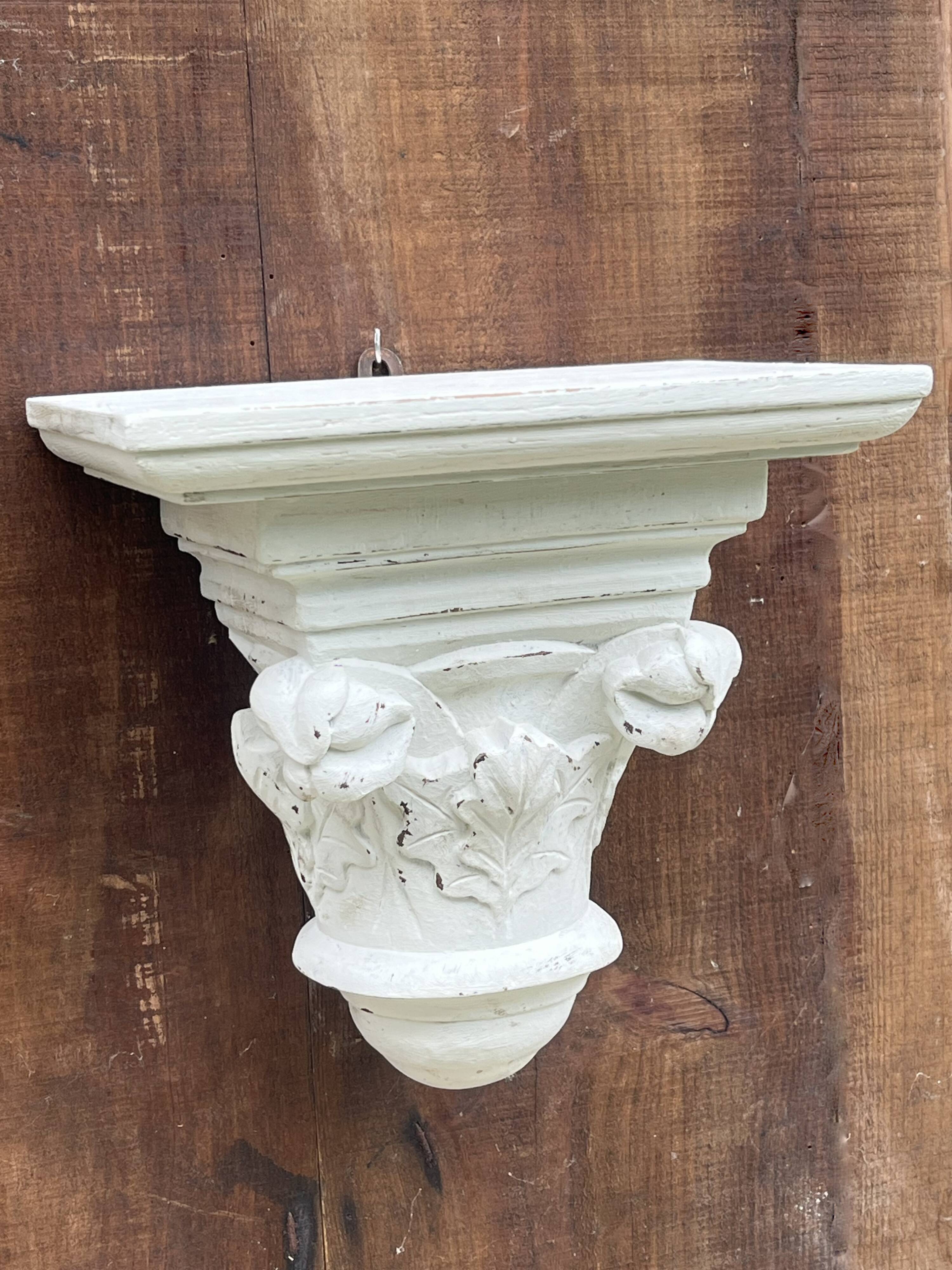Carved wooden wall bracket