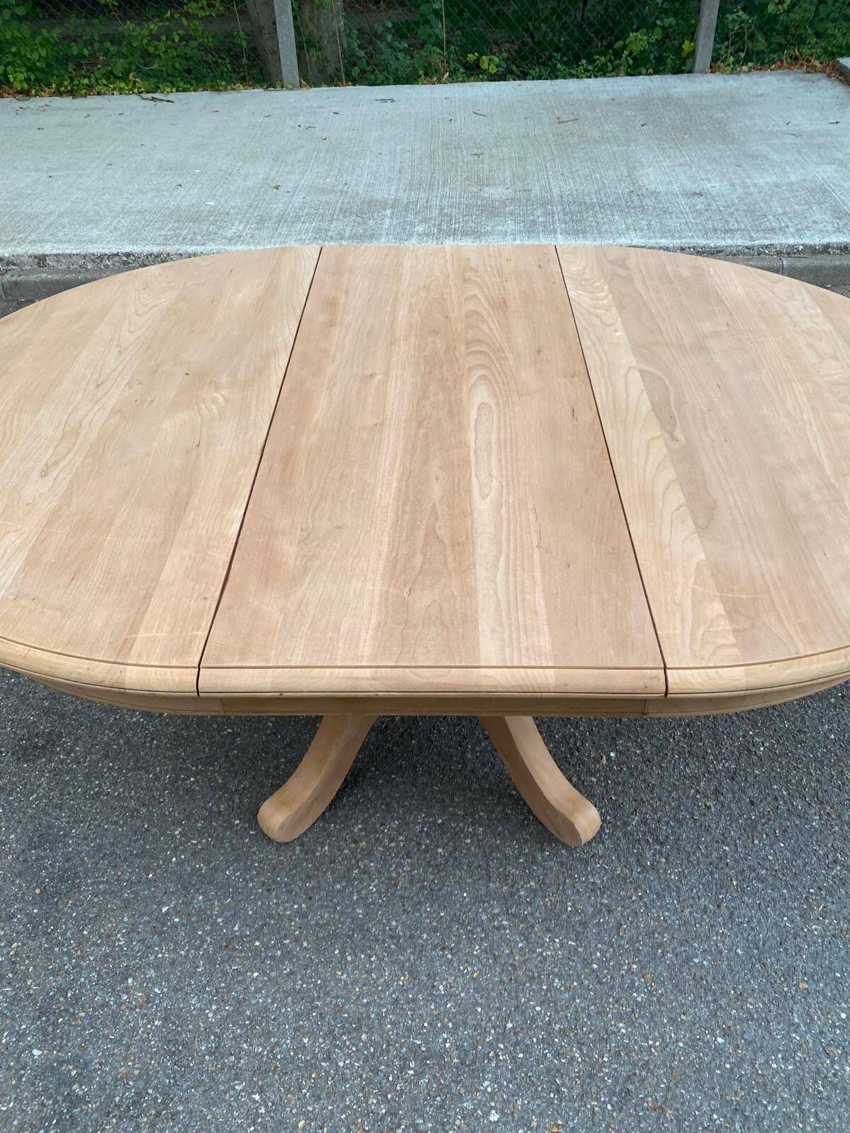 Table à manger ronde extensible décapée en merisier massif brut pied centra