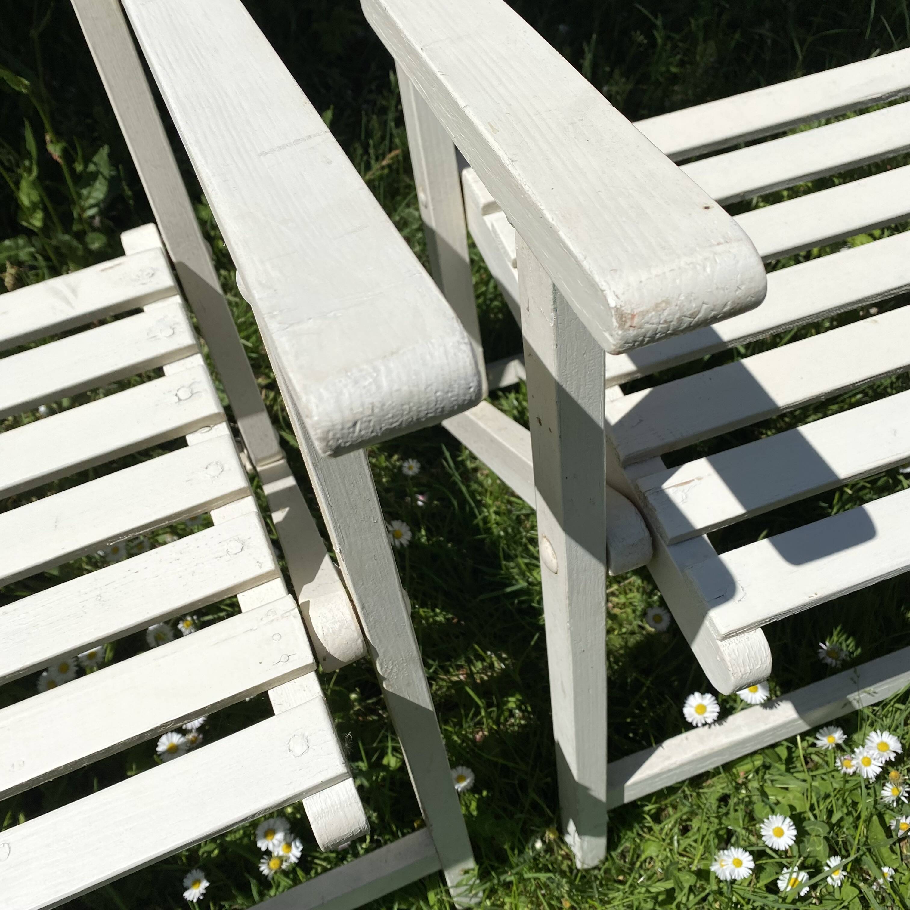 Folding slatted garden armchairs