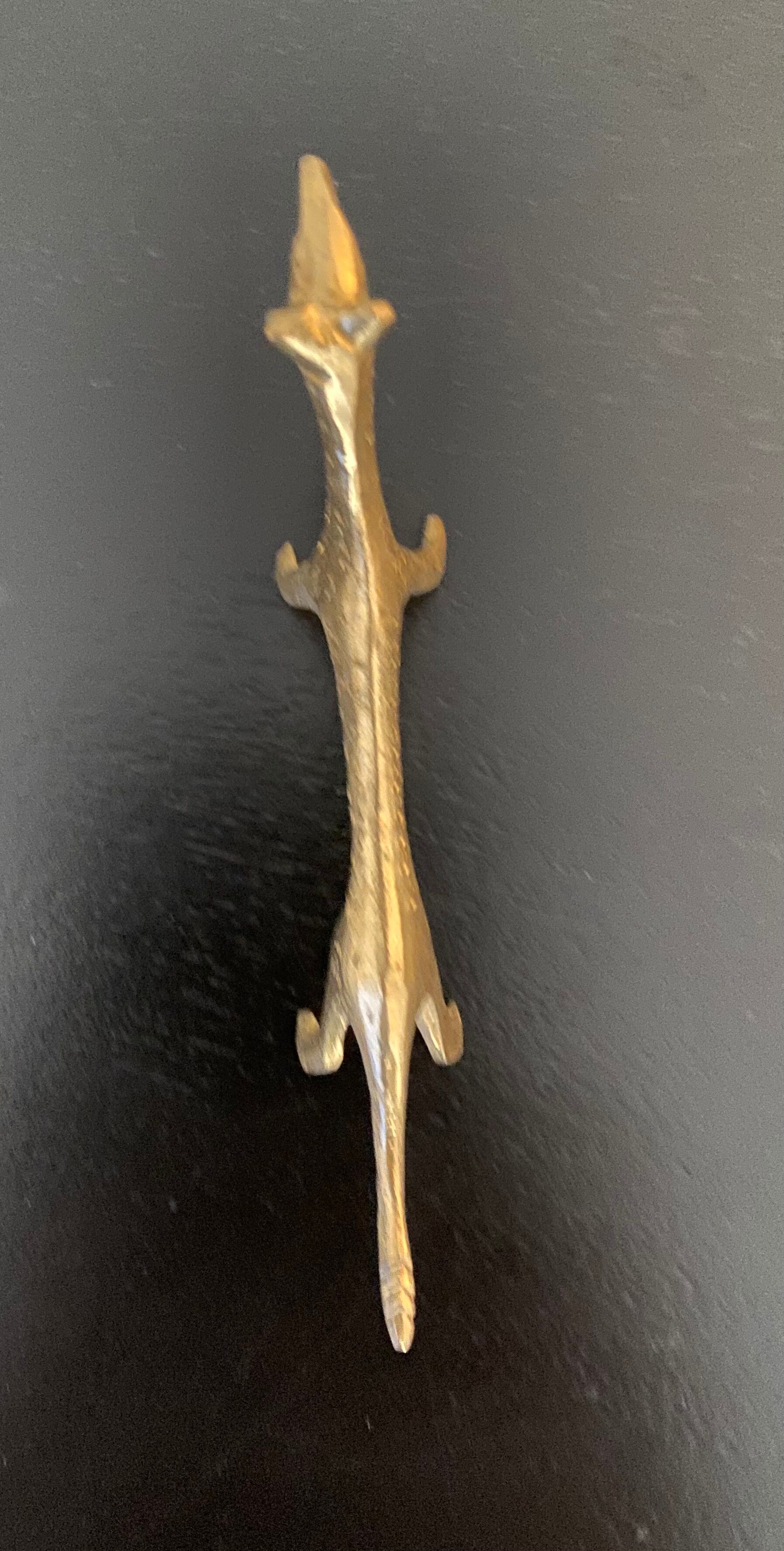 6 lioness-shaped brass knife holders