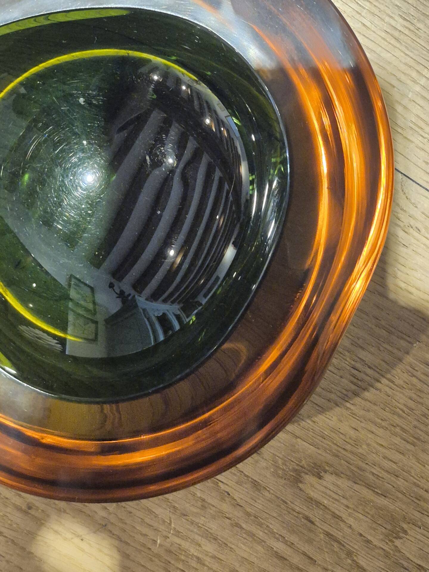Large vintage Murano glass ashtray in olive green and amber.