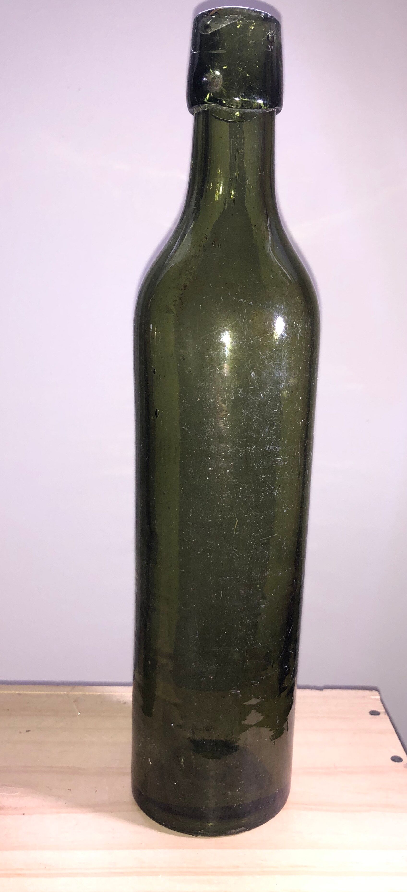 Lot of old blown glass beer bottles with marking