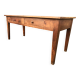 Antique solid cherry farmhouse table with 2 front drawers.