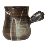 Stoneware pitcher signed by Jacques Pouchain.