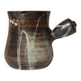 Stoneware pitcher signed by Jacques Pouchain.