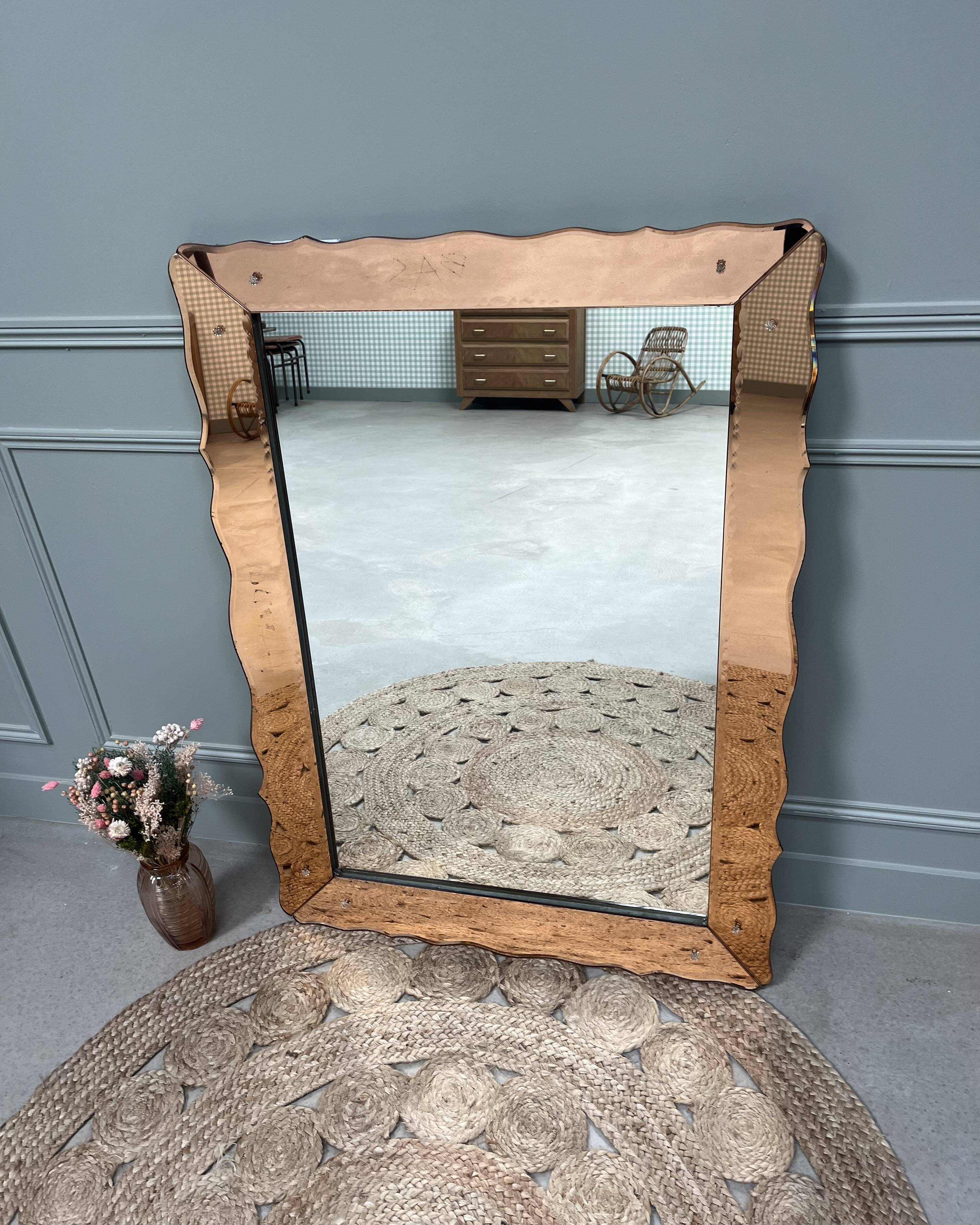 Large pink Venetian mirror