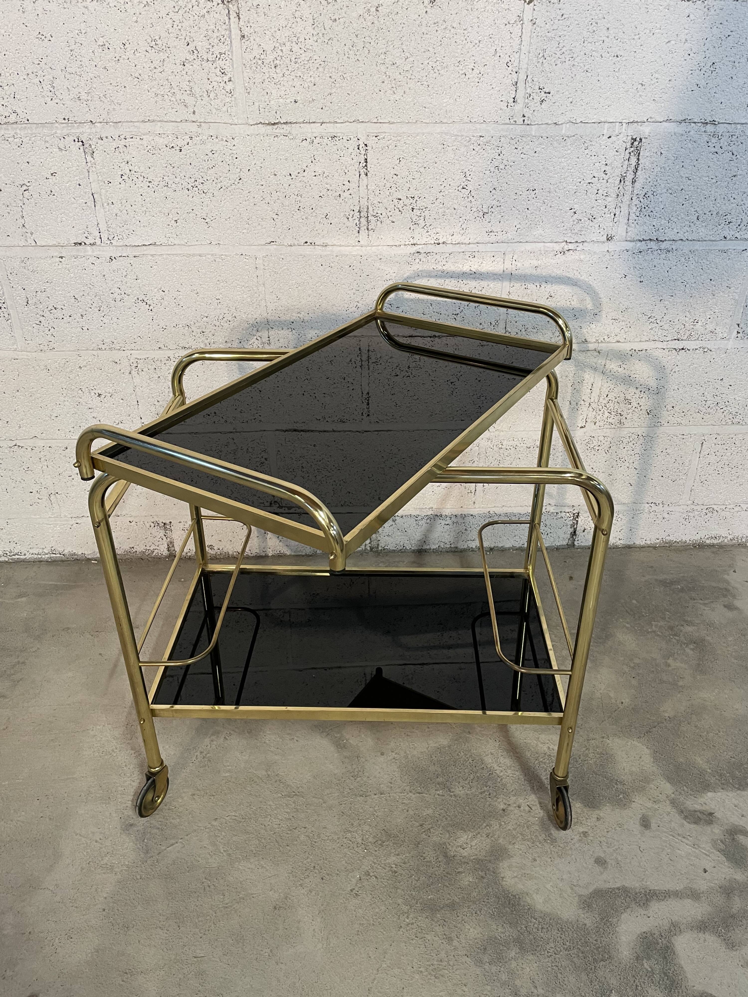 Vintage golden and black rolling service 1970s