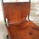 pair of tubular chairs in tawny leather