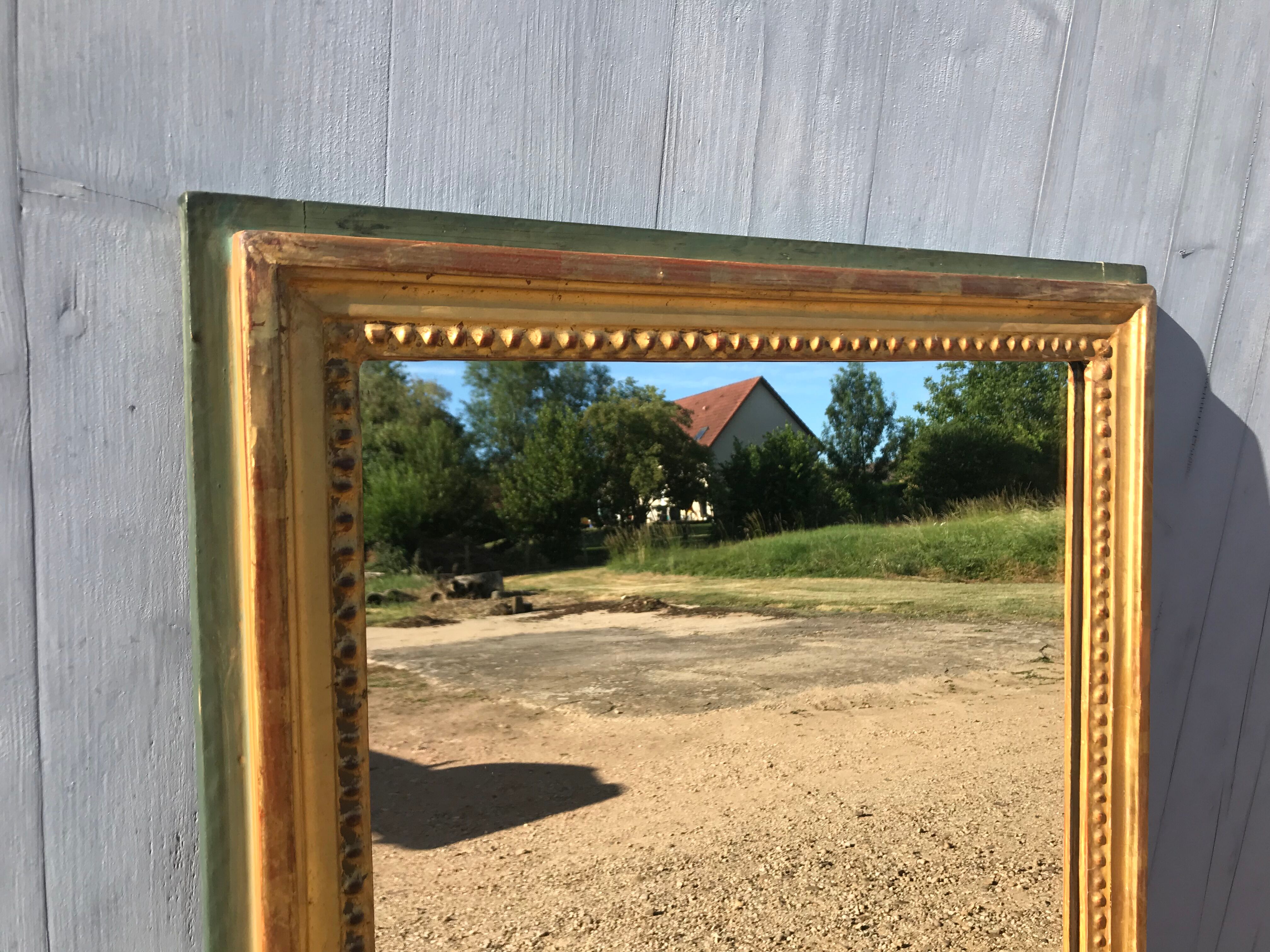 Mirror Louis XVI in between golden with gold leaf 50x150cm