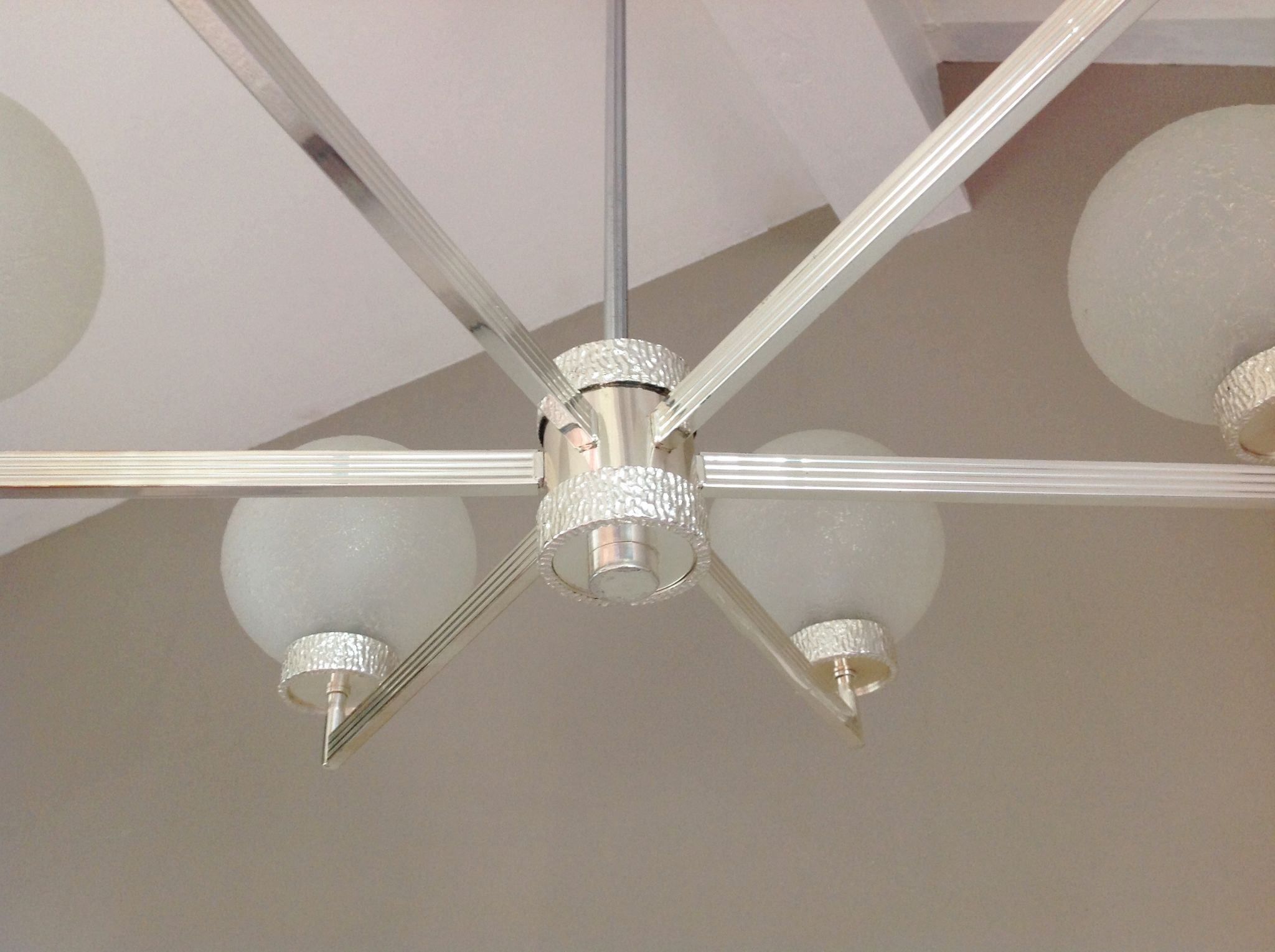 Six-light chrome metal chandelier and opaque glass globes / vintage 60s and 70s