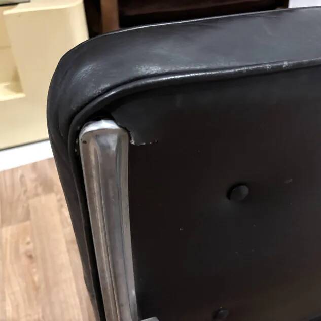 Intermediate Eames chair from the 70s in leather.