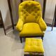 Upholstered toad armchair with footrest