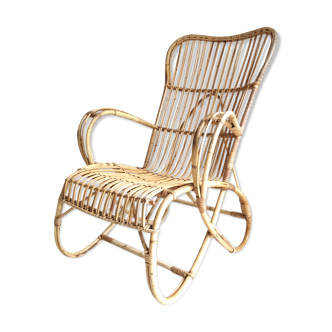 Fauteuil vintage en rotin pieds papillons