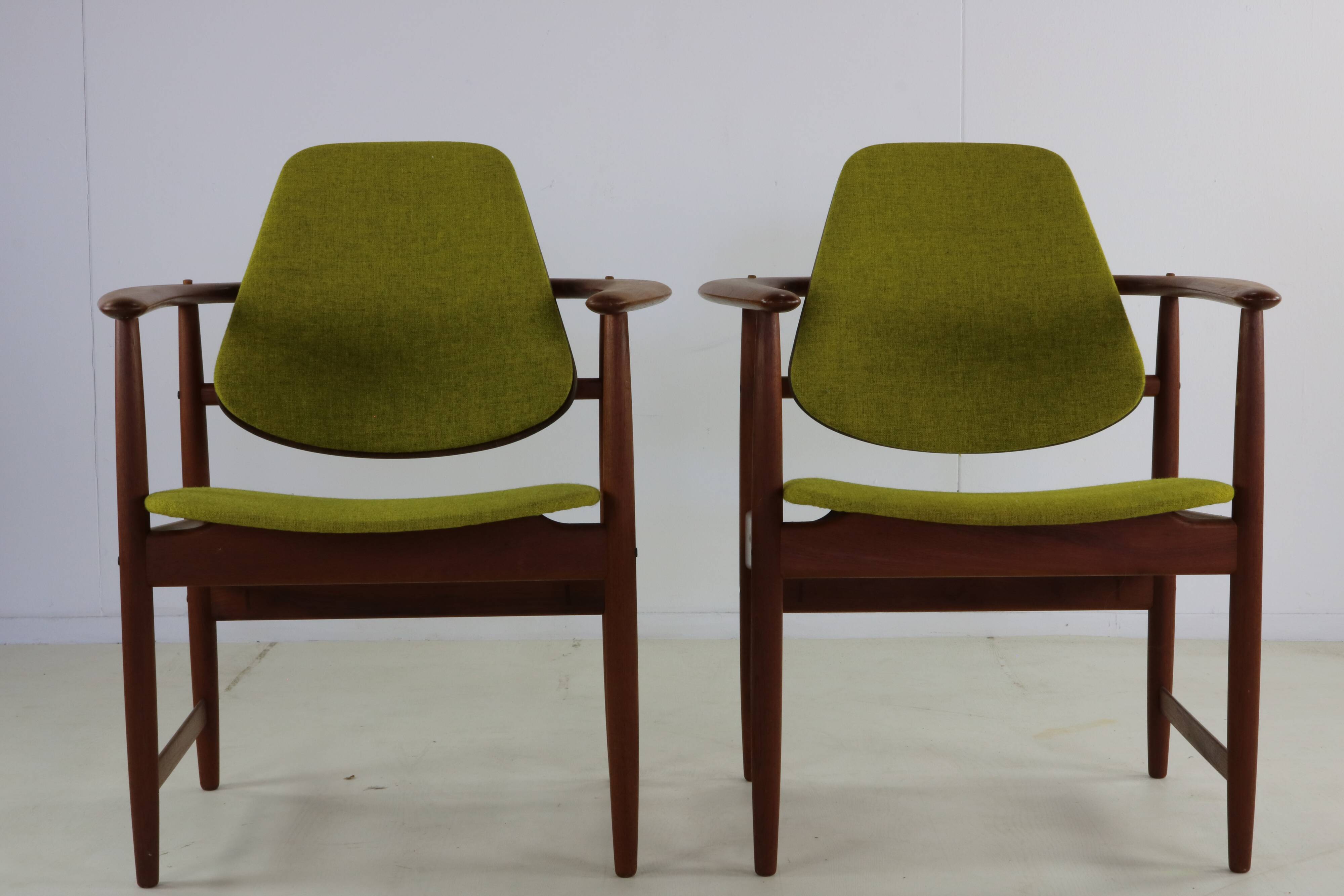 Two Danish design lounge arm chairs by Arne Hovmand Olsen