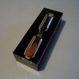 Resin hourglass with inclusion 1970s