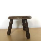 Low tripod stool in solid wood