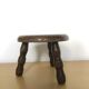 Low tripod stool in solid wood