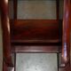 Pair of hardwood library steps with carved dogs, Regency style.
