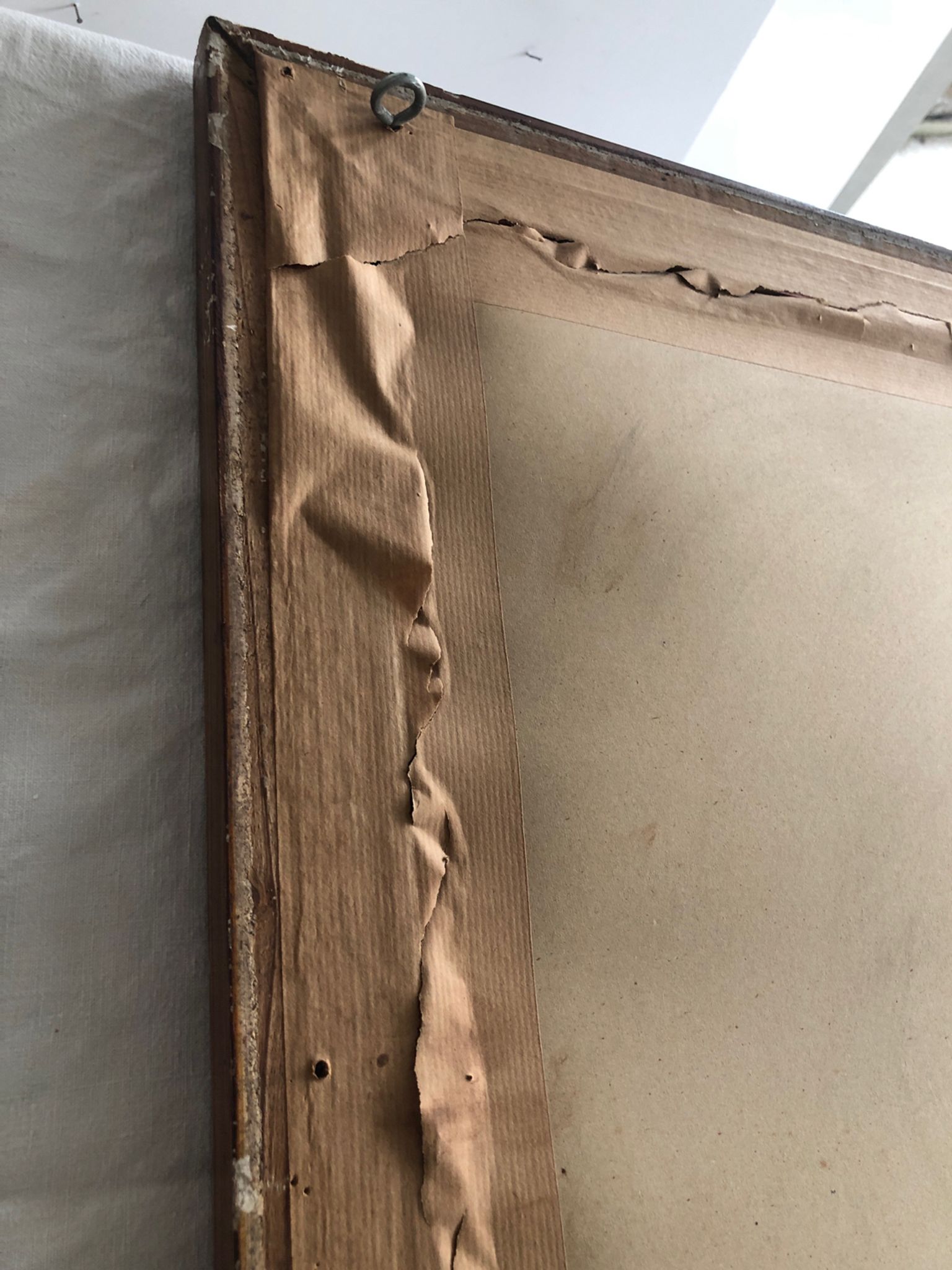 Old mirror with wooden frame and plaster moldings