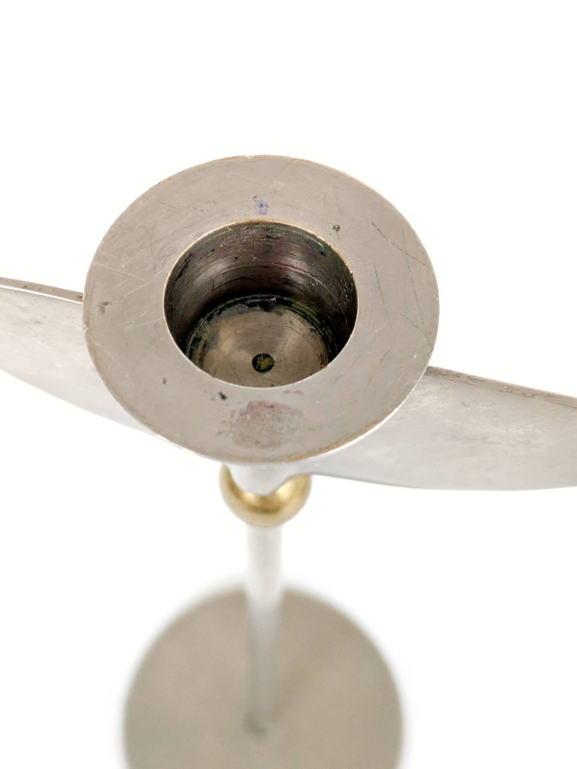 Pair of postmodern 1980s candlesticks, stainless steel and brass