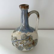 Cherry-decorated earthenware carafe