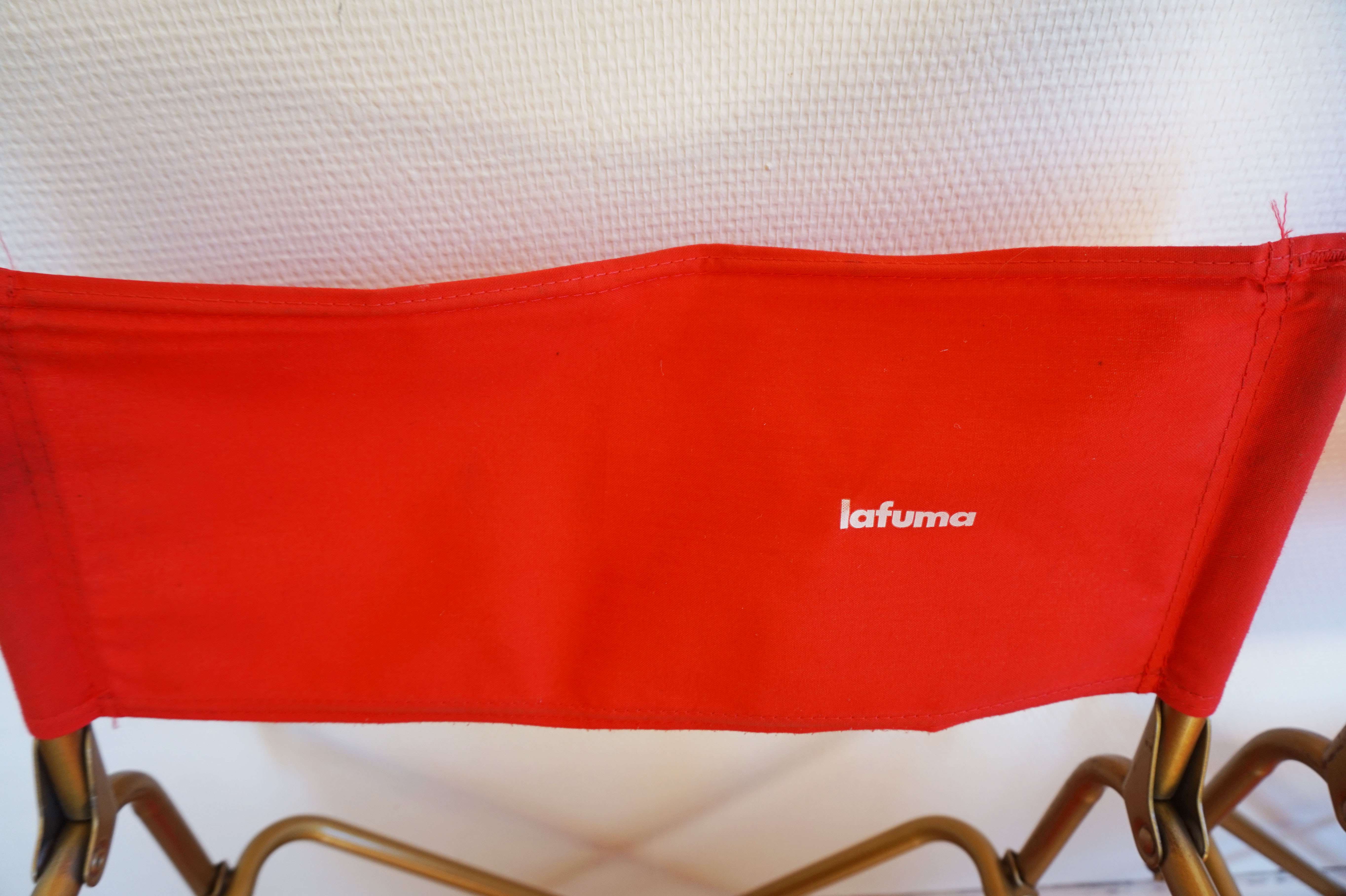 Red vintage pair of lafuma folding chairs